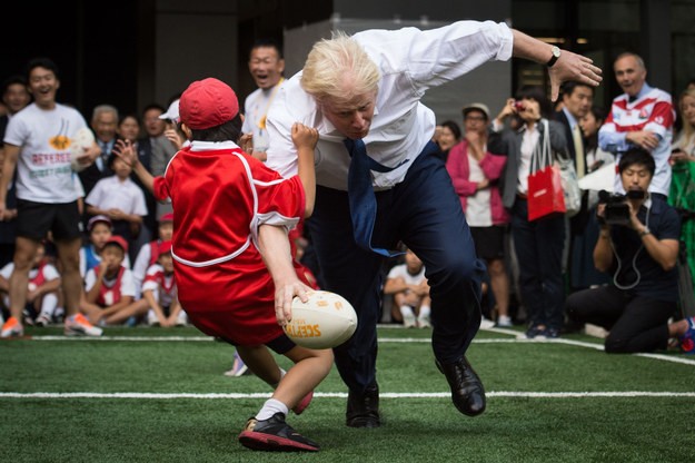 Watch Boris Johnson Truck A Child During Rugby Match