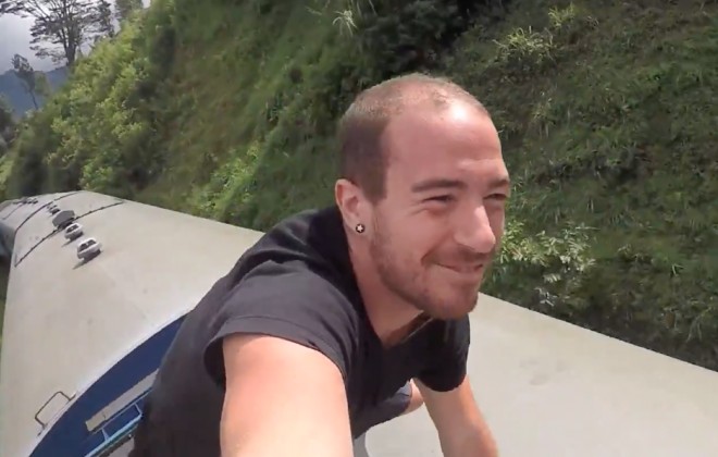Man Of Questionable Judgement Climbs Onto Roof Of Moving Train